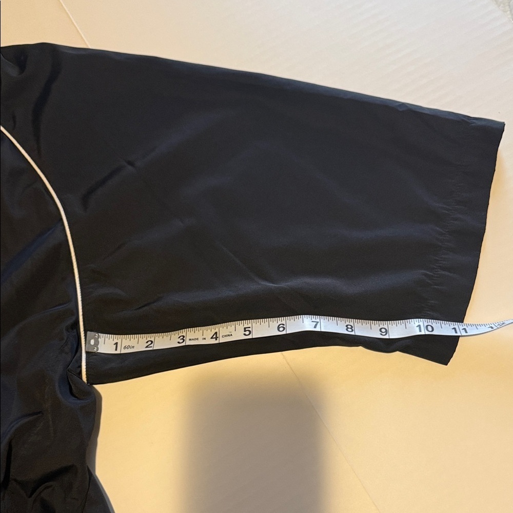 FootJoy Black V-Neck Short Sleeve Pullover with White Piping - Picture 11 of 11